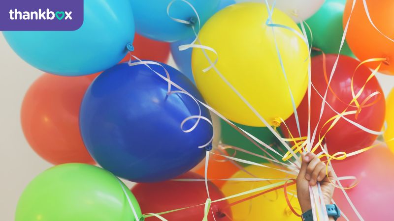 Bunch of balloons being held