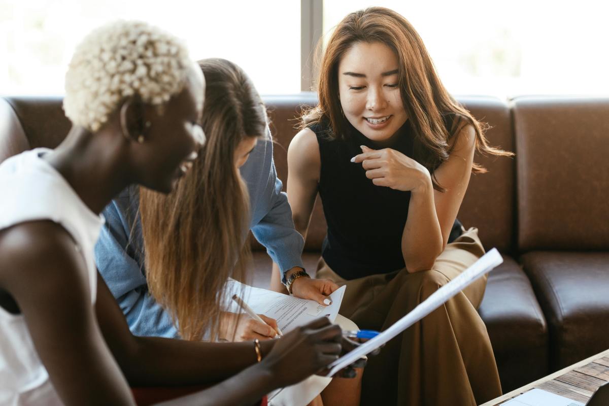 Multiethnic colleagues talking in the office