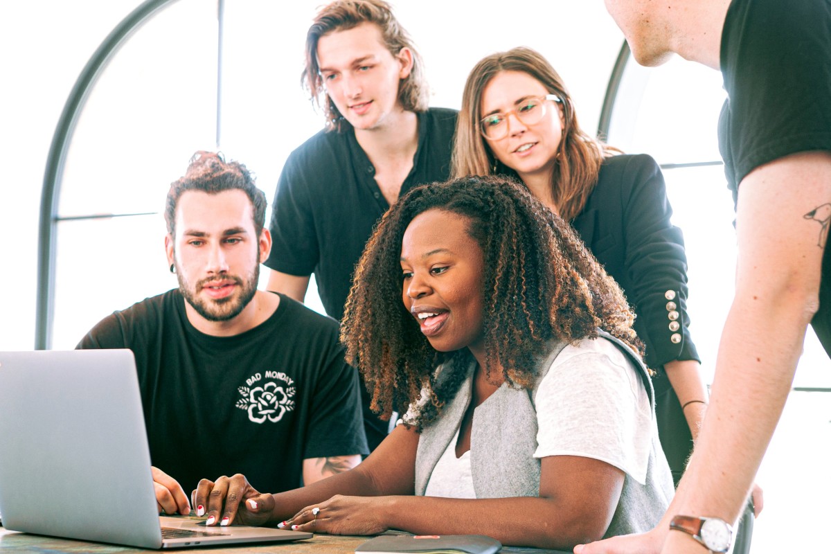 Woman sharing her presentation with her colleagues