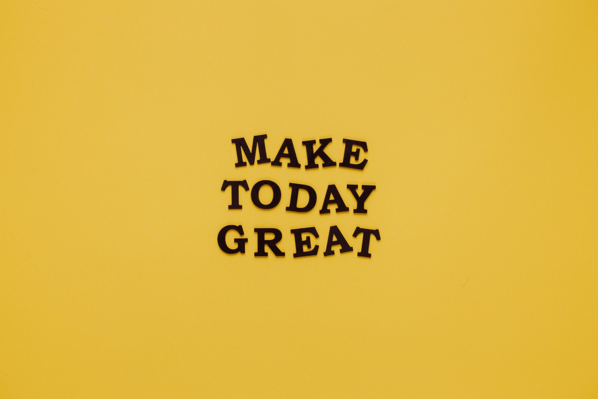 Motivational quote "Make Today Great" on yellow background